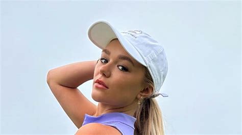 Paige Spiranac rival Katie Sigmond poses in barely there gold。